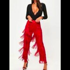 Red tiered fringe pants